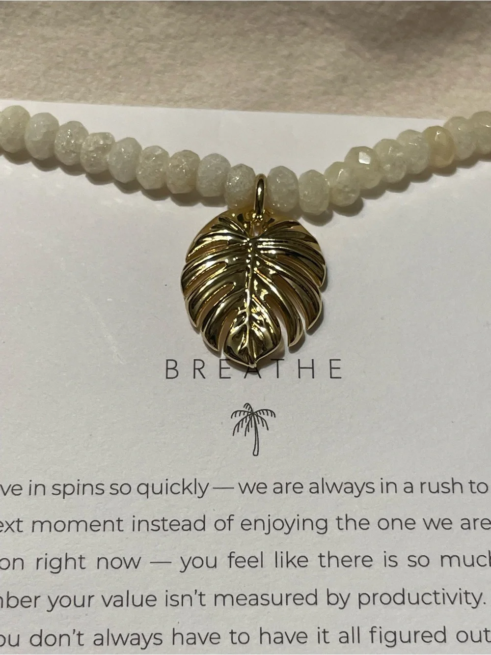 Gold Monstera Leaf Pendant Necklace with Cream Beads